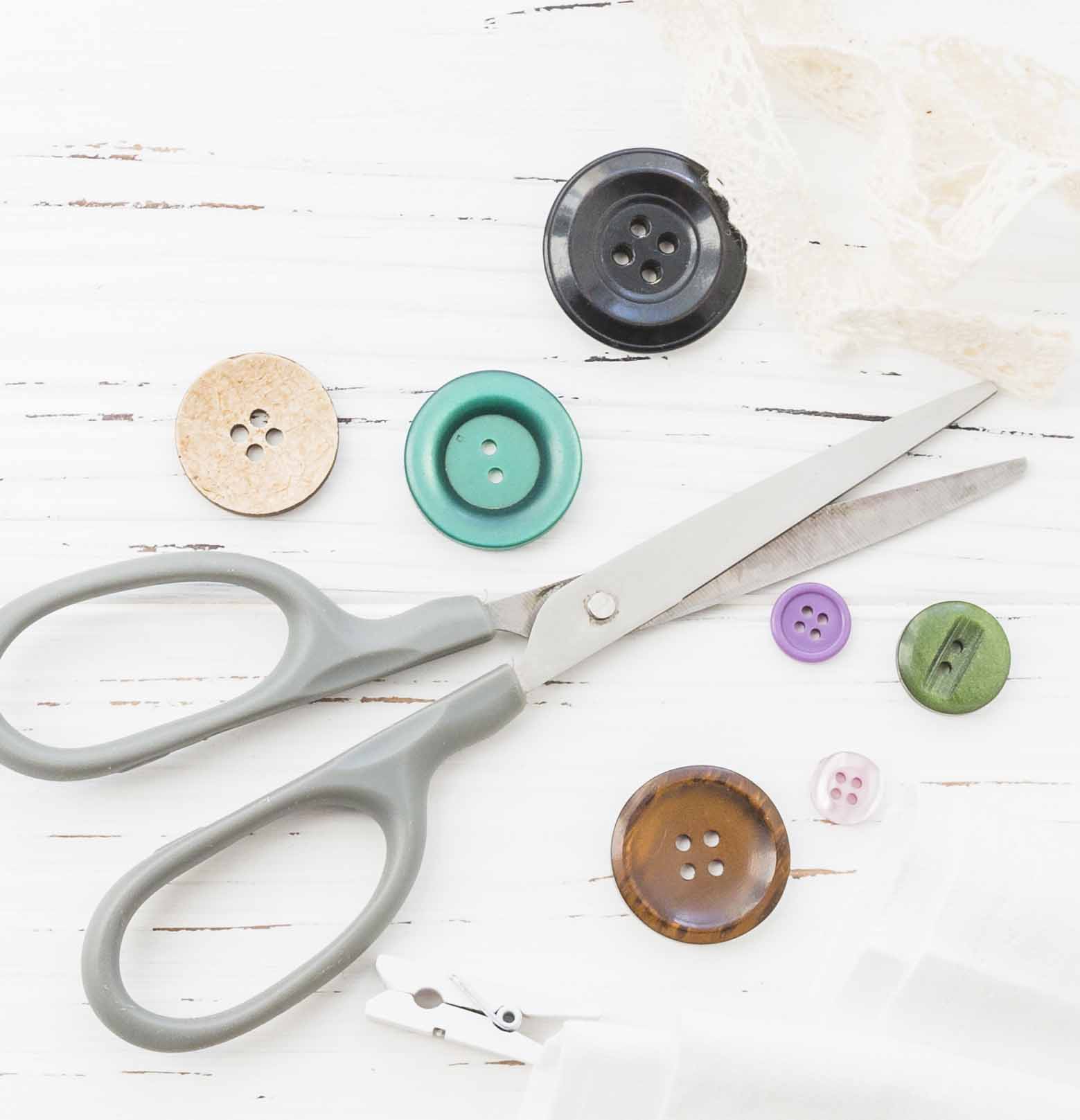 An image of buttons and scissors