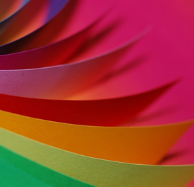 Multicoloured sheets of paper fanned out