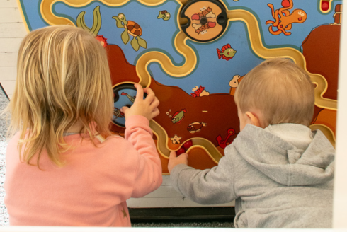 preschoolers playing at the library