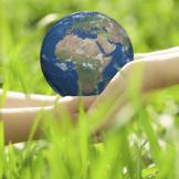 hands holding a globe