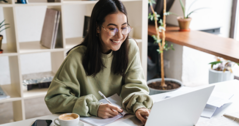 girl sitting in front of computer