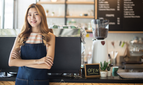 young woman running a cafe