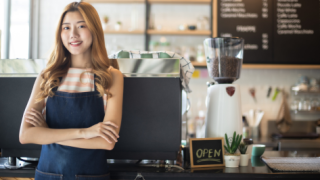 young woman running a cafe