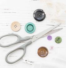 An image of scissors and buttons